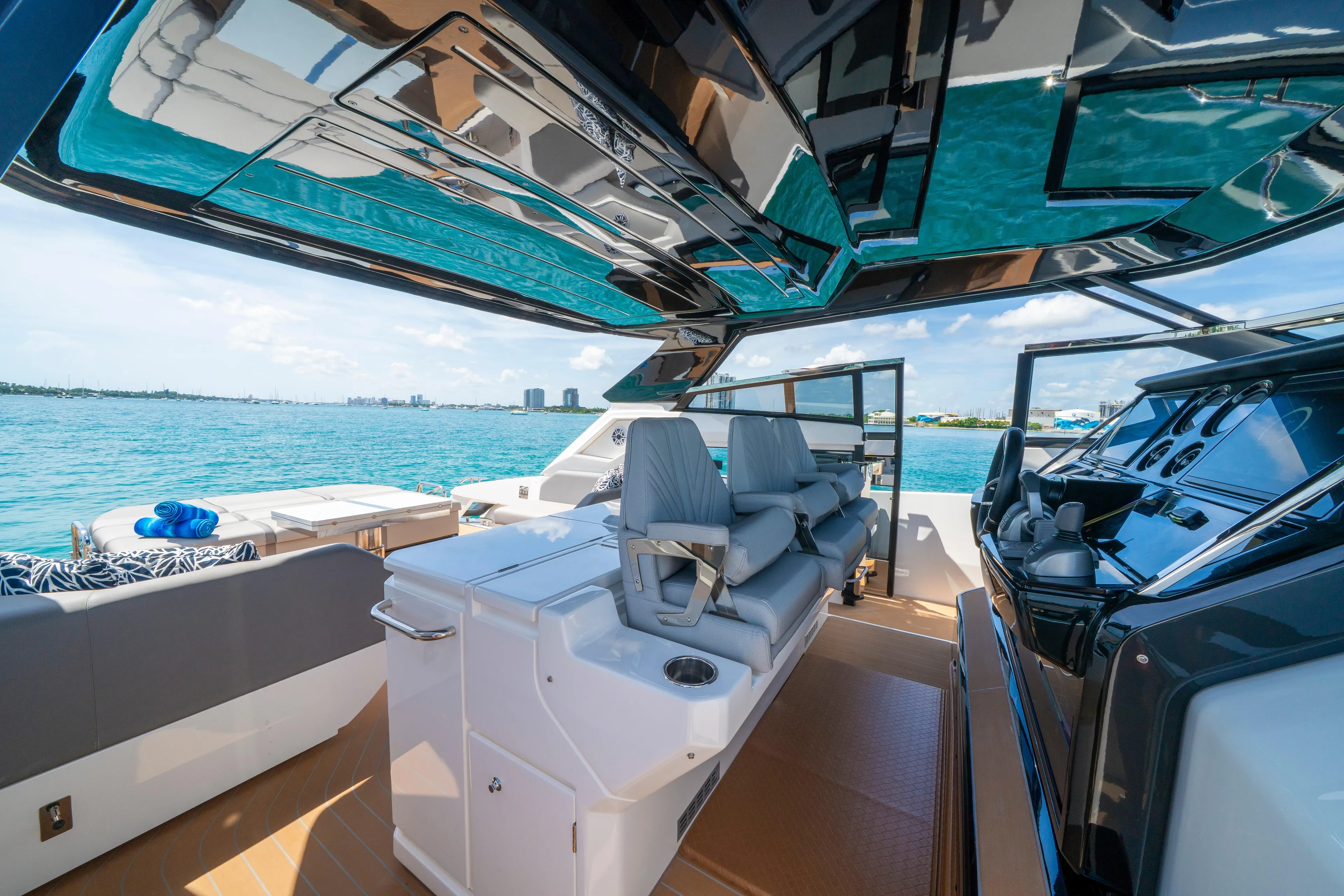  Yacht Photos Pics Luxurious 2024 Sunseeker Superhawk 55 yacht interior with sleek design and ocean view.