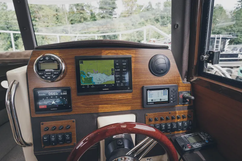  Yacht Photos Pics Helm of 2025 Ranger Tugs R-23 with advanced navigation and control systems.