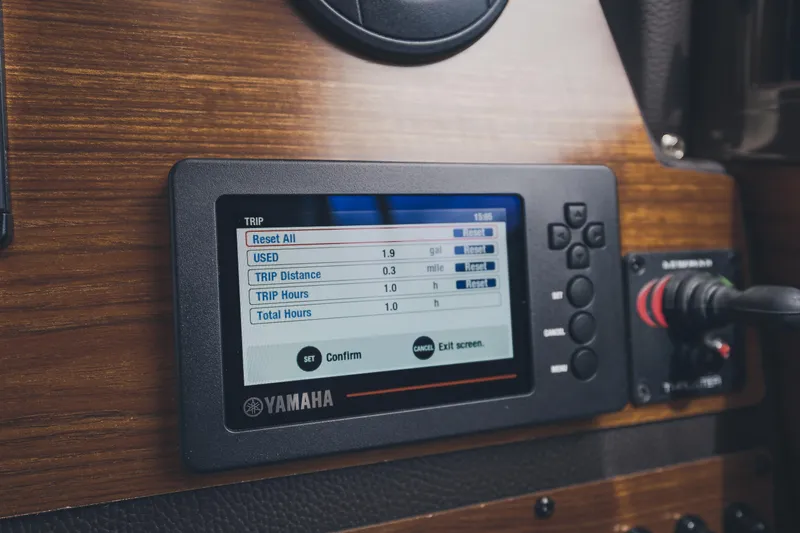  Yacht Photos Pics Yamaha display on 2025 Ranger Tugs R-23 boat dashboard, showing trip data.