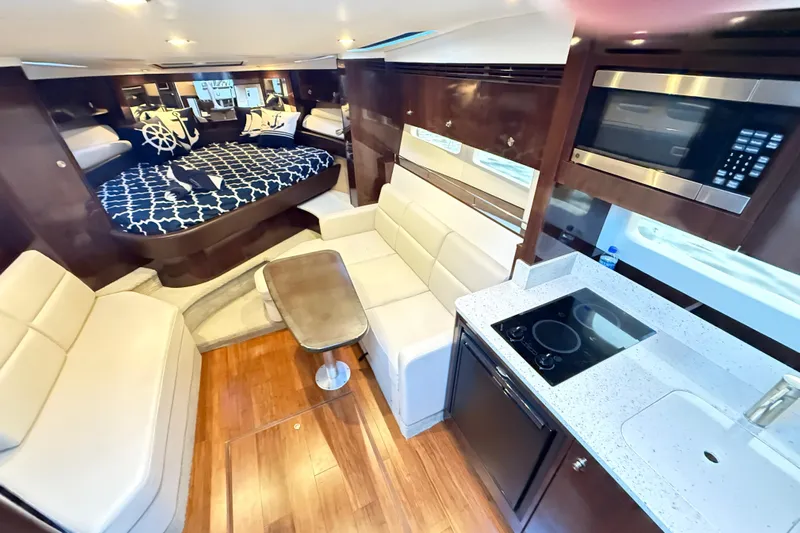  Yacht Photos Pics Luxurious interior of 2015 Sea Ray 350 Sundancer yacht with modern amenities.