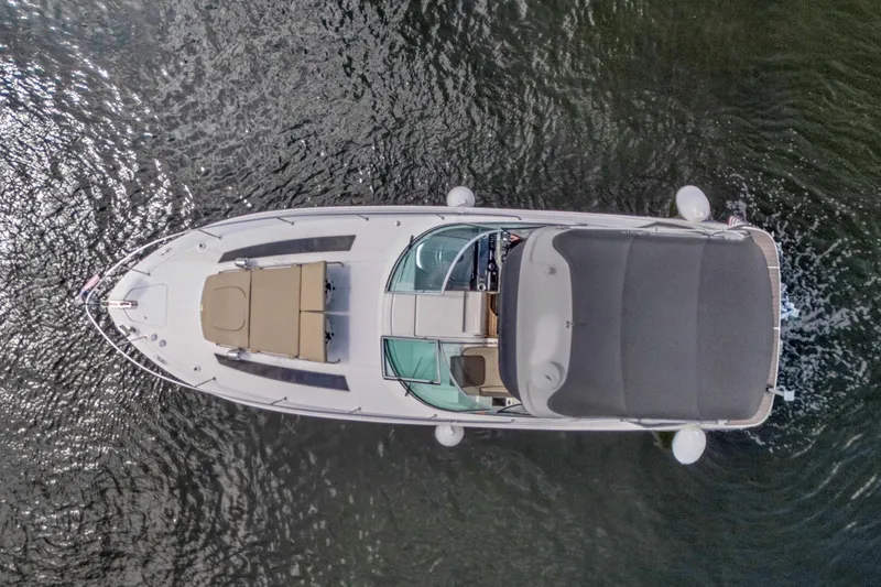  Yacht Photos Pics Overhead view of 2015 Sea Ray 350 Sundancer yacht on water.
