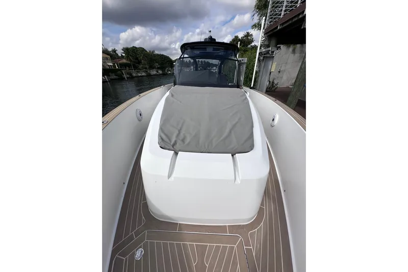 No Name Yacht Photos Pics 2024 Pardo Yachts P38 boat with sleek deck design and cushioned seating.