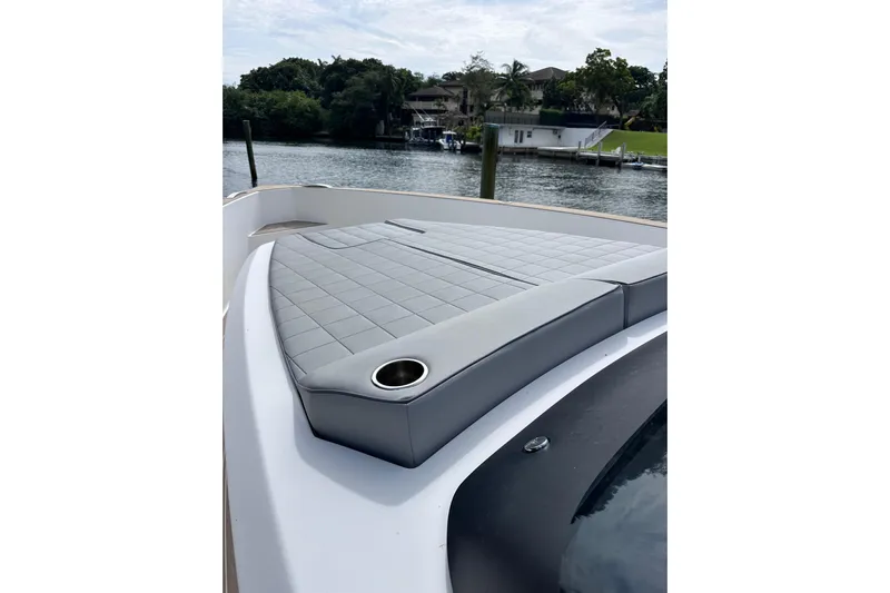 No Name Yacht Photos Pics 2024 Pardo Yachts P38 with sleek deck design and luxurious seating by the water.