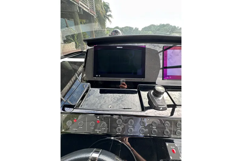 No Name Yacht Photos Pics 2024 Pardo Yachts P38 dashboard with advanced navigation controls and display screens.