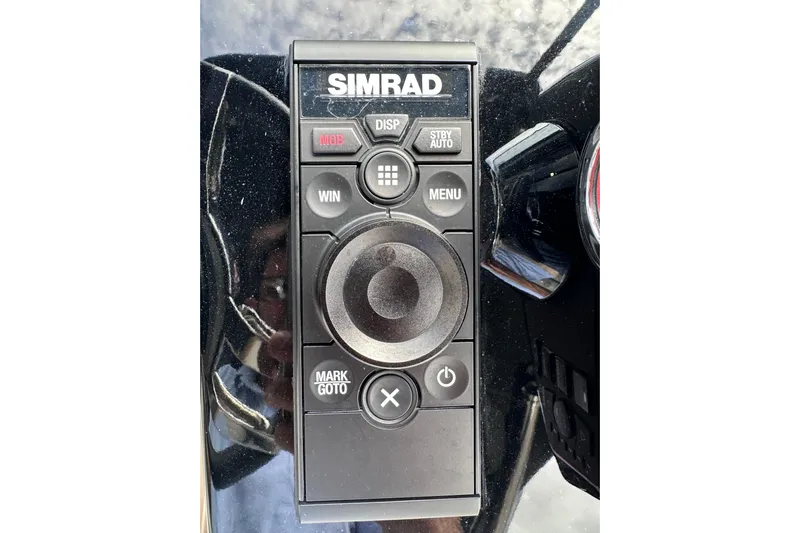 No Name Yacht Photos Pics Simrad control panel on 2024 Pardo Yachts P38, featuring navigation buttons.