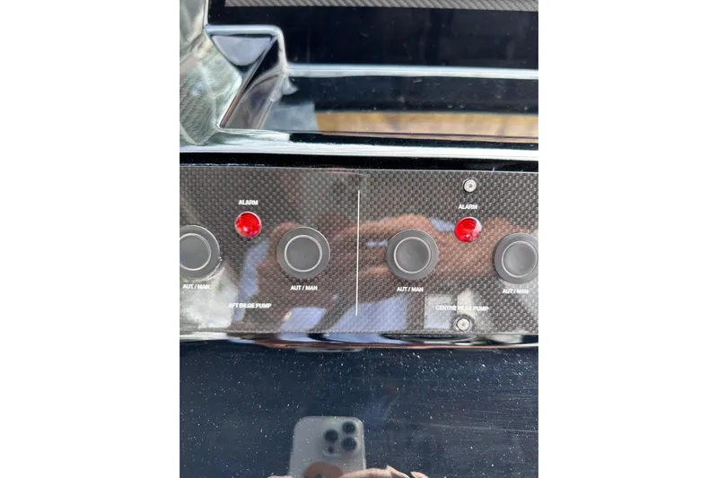 No Name Yacht Photos Pics Control panel of 2024 Pardo Yachts P38 with alarm and bilge pump buttons.