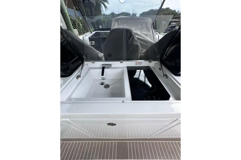 No Name Yacht Photos Pics 2024 Pardo Yachts P38 yacht kitchen area with sink and stove.