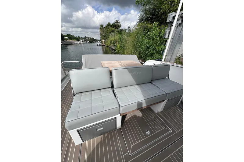 No Name Yacht Photos Pics 2024 Pardo Yachts P38 deck with sleek seating and scenic waterway view.