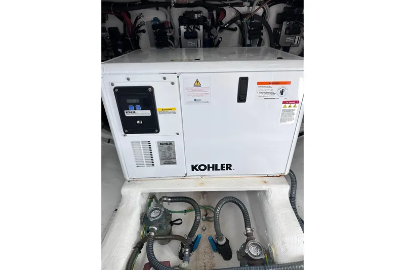 No Name Yacht Photos Pics Kohler generator in 2024 Pardo Yachts P38 engine room, showcasing marine equipment.