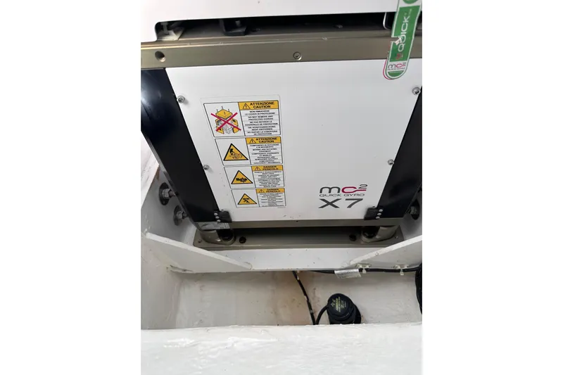 No Name Yacht Photos Pics 2024 Pardo Yachts P38 MC2 Quick Gyro X7 stabilizer system with caution labels.
