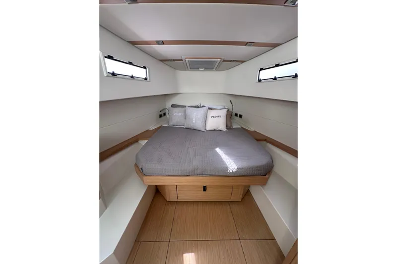 No Name Yacht Photos Pics 2024 Pardo Yachts P38 cabin interior with modern design and cozy bedding.