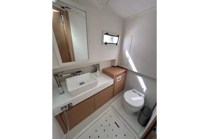 No Name Yacht Photos Pics Luxurious bathroom in 2024 Pardo Yachts P38, featuring modern sink and toilet.