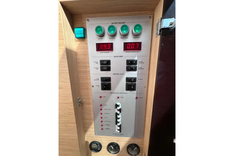 No Name Yacht Photos Pics Control panel of 2024 Pardo Yachts P38, featuring battery breakers and voltage display.