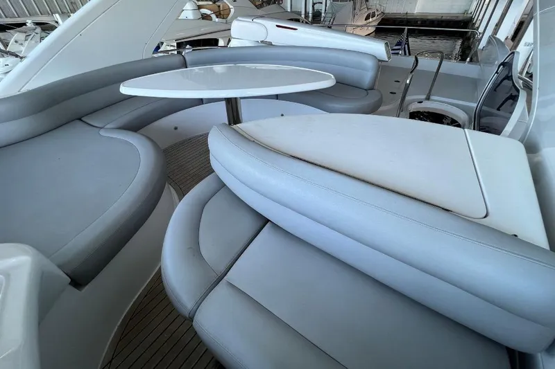  Yacht Photos Pics Luxurious seating area on a 2006 Azimut FLY 55 yacht with sleek design.