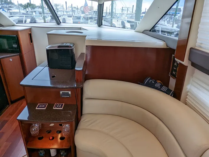 Lady C Yacht Photos Pics Interior of 2011 Meridian 341 Sedan yacht with leather seating and wooden cabinetry.