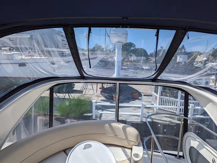 Lady C Yacht Photos Pics Interior view of 2011 Meridian 341 Sedan yacht with clear windows and seating area.