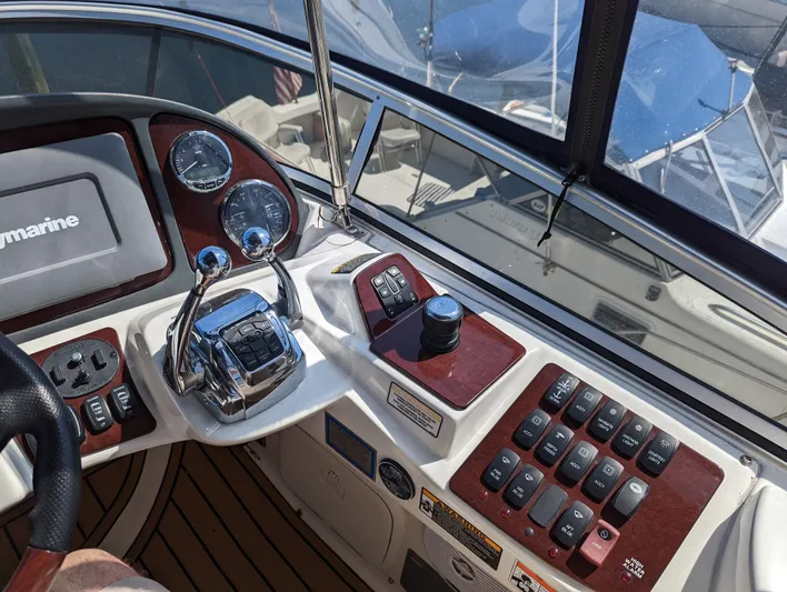Lady C Yacht Photos Pics Control panel of a 2011 Meridian 341 Sedan yacht with navigation instruments.