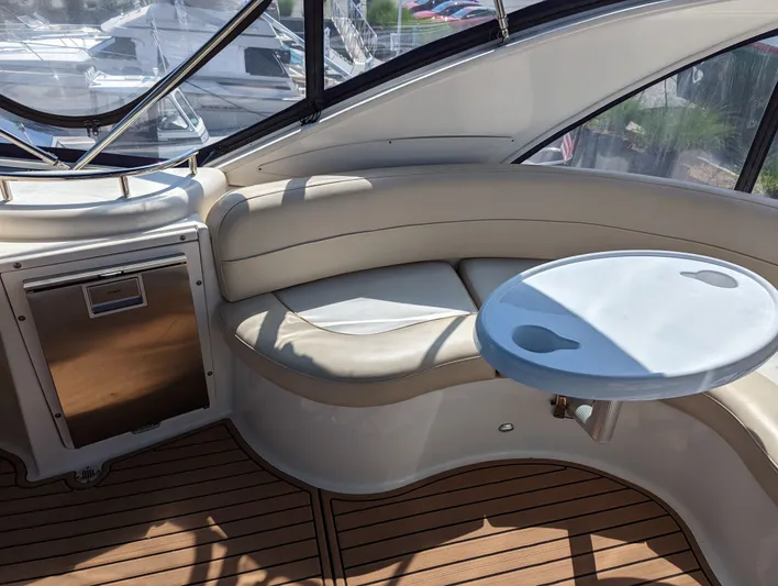 Lady C Yacht Photos Pics Interior of 2011 Meridian 341 Sedan yacht with seating and table.