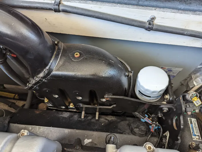 Lady C Yacht Photos Pics Engine compartment of a 2011 Meridian 341 Sedan boat, showing components and wiring.