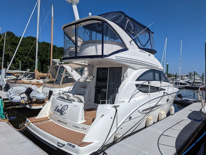 Lady C Yacht Photos Pics 2011 Meridian 341 Sedan yacht docked at marina under clear blue sky.