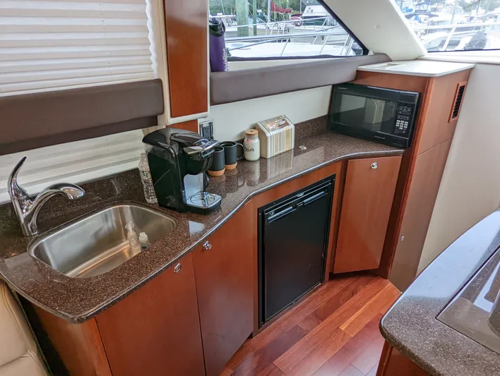 Lady C Yacht Photos Pics 2011 Meridian 341 Sedan yacht kitchen with sink, microwave, and coffee maker.