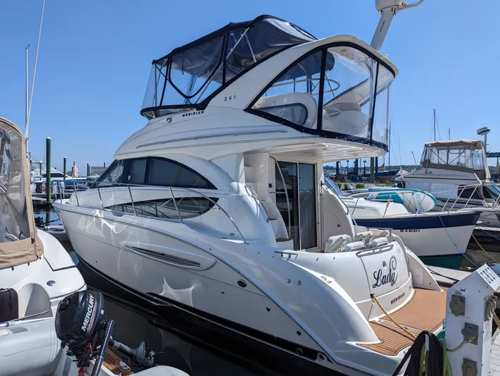 Lady C Yacht Photos Pics 2011 Meridian 341 Sedan yacht docked at marina under clear blue sky.