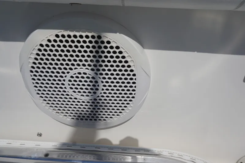 Past Time Yacht Photos Pics Speaker on 2012 Regulator 32 Forward Seating boat, close-up view.