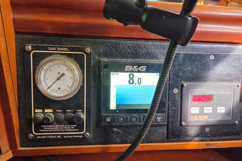 Pemaquid Yacht Photos Pics Control panel of a 1998 Oyster 485 Deck Saloon with depth and tank gauges.