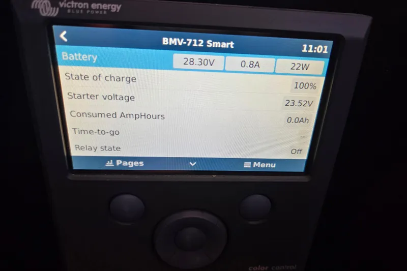 Pemaquid Yacht Photos Pics Victron Energy BMV-712 Smart battery monitor displaying charge status on Oyster 485 Deck Saloon.