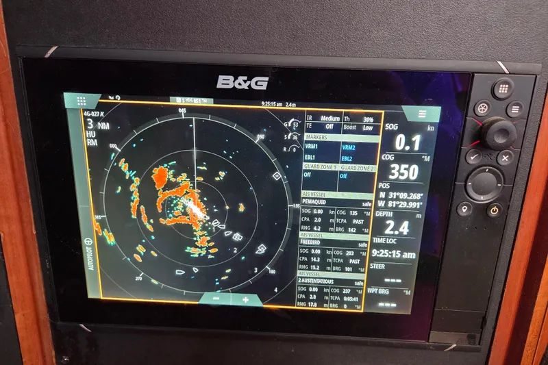 Pemaquid Yacht Photos Pics B&G navigation display on 1998 Oyster 485 Deck Saloon, showing radar and vessel data.