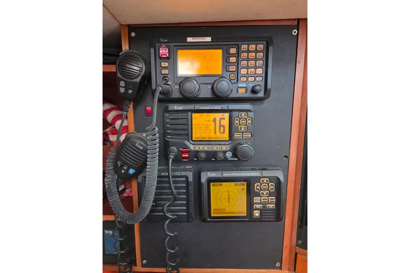 Pemaquid Yacht Photos Pics Control panel with communication devices on a 1998 Oyster 485 Deck Saloon yacht.