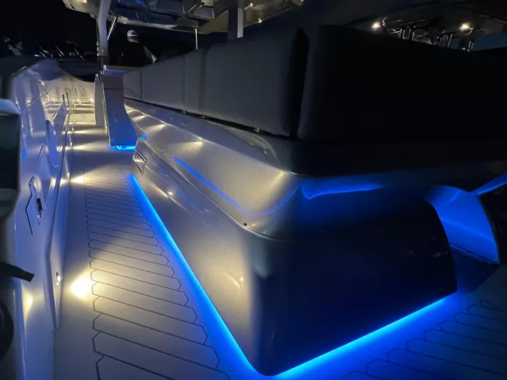  Yacht Photos Pics 2023 Canados 493 Gladiator yacht interior with blue LED lighting.
