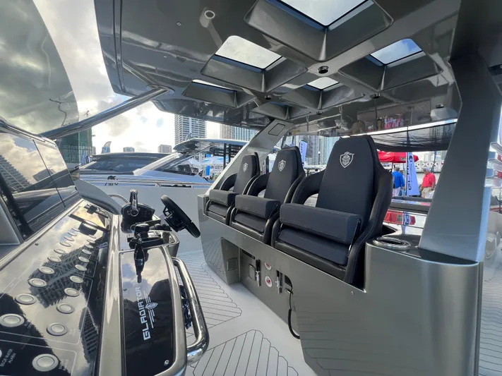  Yacht Photos Pics Interior of 2023 Canados 493 Gladiator yacht, featuring sleek design and modern seating.