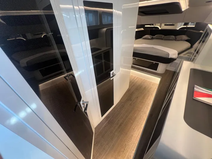  Yacht Photos Pics Interior of 2023 Canados 493 Gladiator yacht, featuring modern design and luxurious sleeping area.