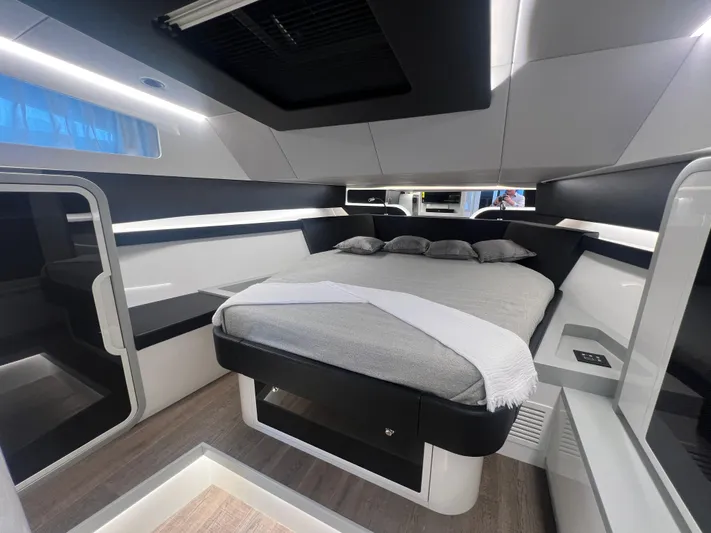  Yacht Photos Pics Luxurious interior of 2023 Canados 493 Gladiator yacht, featuring a modern bedroom design.