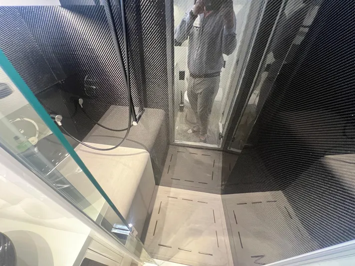  Yacht Photos Pics Interior of 2023 Canados 493 Gladiator yacht with sleek carbon fiber design.