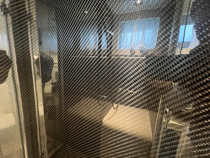  Yacht Photos Pics 2023 Canados 493 Gladiator interior with carbon fiber detailing.