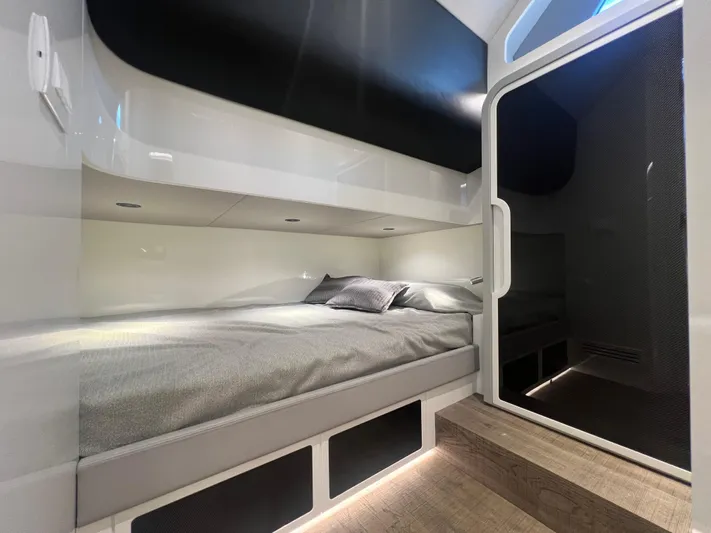  Yacht Photos Pics 2023 Canados 493 Gladiator cabin interior with modern bed and sleek design.