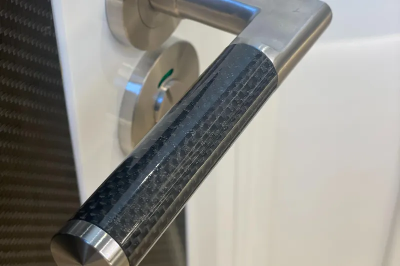  Yacht Photos Pics 2023 Canados 493 Gladiator door handle with sleek carbon fiber design.