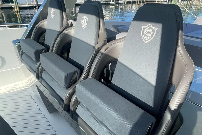  Yacht Photos Pics 2023 Canados 493 Gladiator luxury boat seats with embroidered logos.