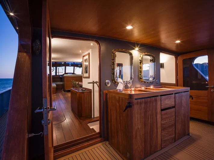 La Fenice Yacht Photos Pics Interior of a 1962 Laurent Giles yacht with elegant wood design.