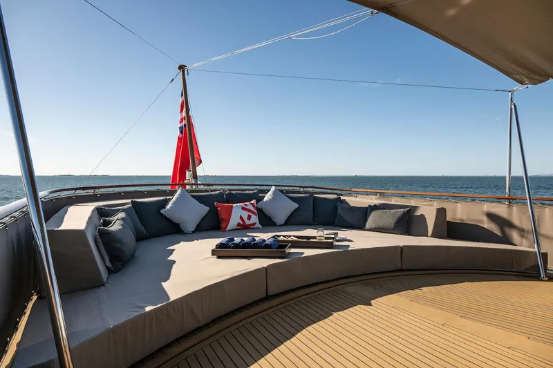 La Fenice Yacht Photos Pics Luxurious lounge on 1962 Laurent Giles yacht with ocean view.