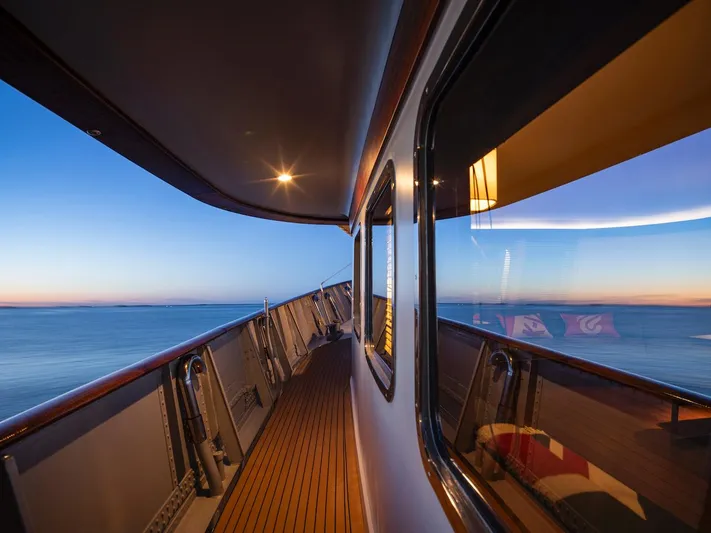 La Fenice Yacht Photos Pics Laurent Giles 1962 yacht at sunset, elegant deck design.