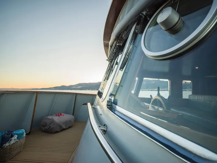 La Fenice Yacht Photos Pics Laurent Giles 1962 yacht deck at sunset, elegant design.