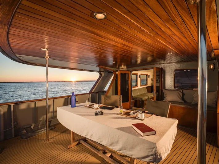 La Fenice Yacht Photos Pics Interior of 1962 Laurent Giles yacht at sunset.