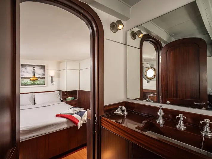 La Fenice Yacht Photos Pics Luxurious cabin on 1962 Laurent Giles yacht with wood finish.