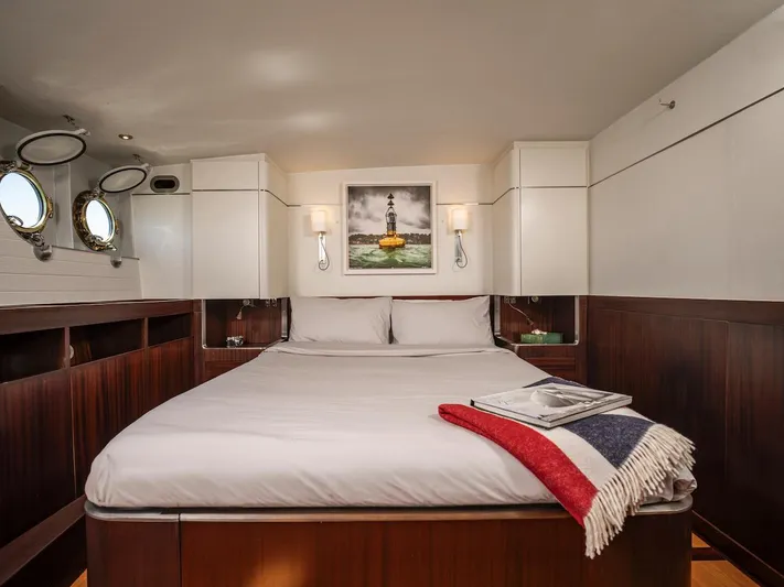 La Fenice Yacht Photos Pics Luxurious cabin on 1962 Laurent Giles yacht with cozy bed.