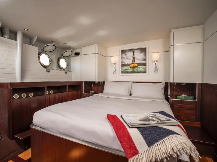 La Fenice Yacht Photos Pics Luxurious cabin on 1962 Laurent Giles yacht with cozy bed.