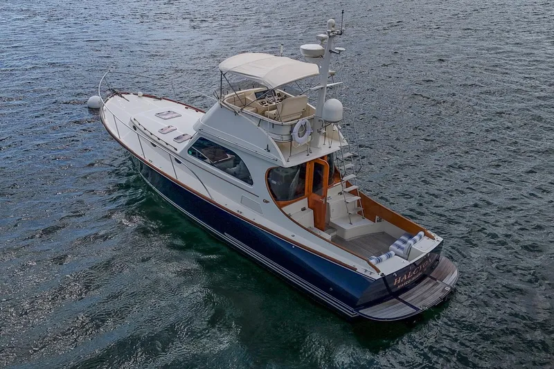 Halcyon Yacht Photos Pics 2006 Hinckley Talaria 44 FB yacht cruising on open water.