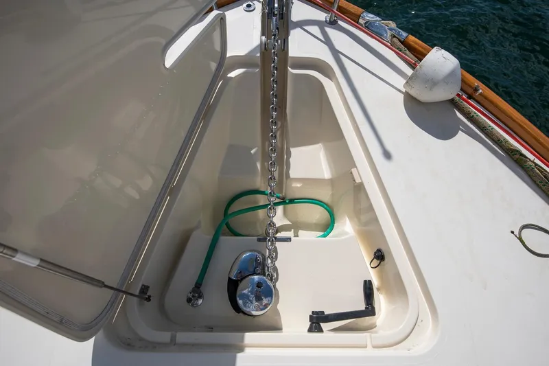 Halcyon Yacht Photos Pics Anchor locker of 2006 Hinckley Talaria 44 FB yacht with chain and hose.